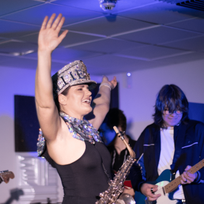 Ellie Sax performing with Calderdale College Music Students